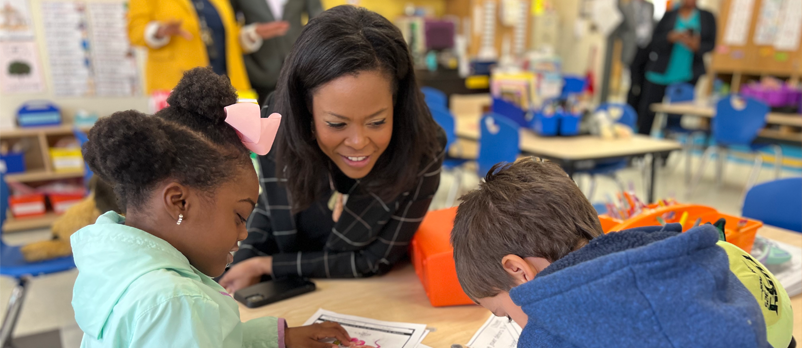 Interim Superintendent Crystal Hill visiting with local elementary school students